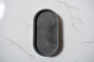  Gray Oval Concrete Tray on White Marble Background